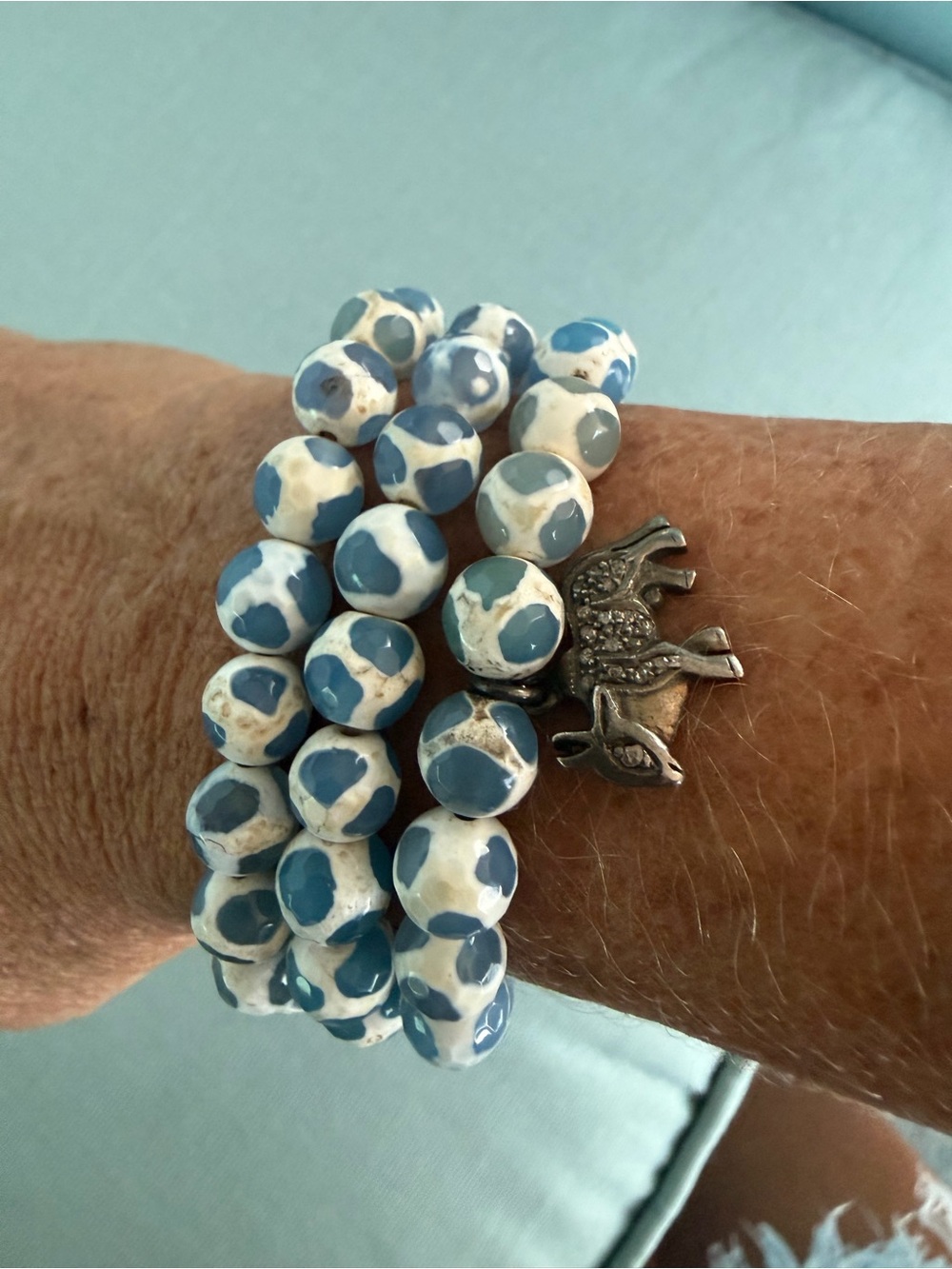 Stackable Blue and White Beaded Bracelet with Elephant Charm.